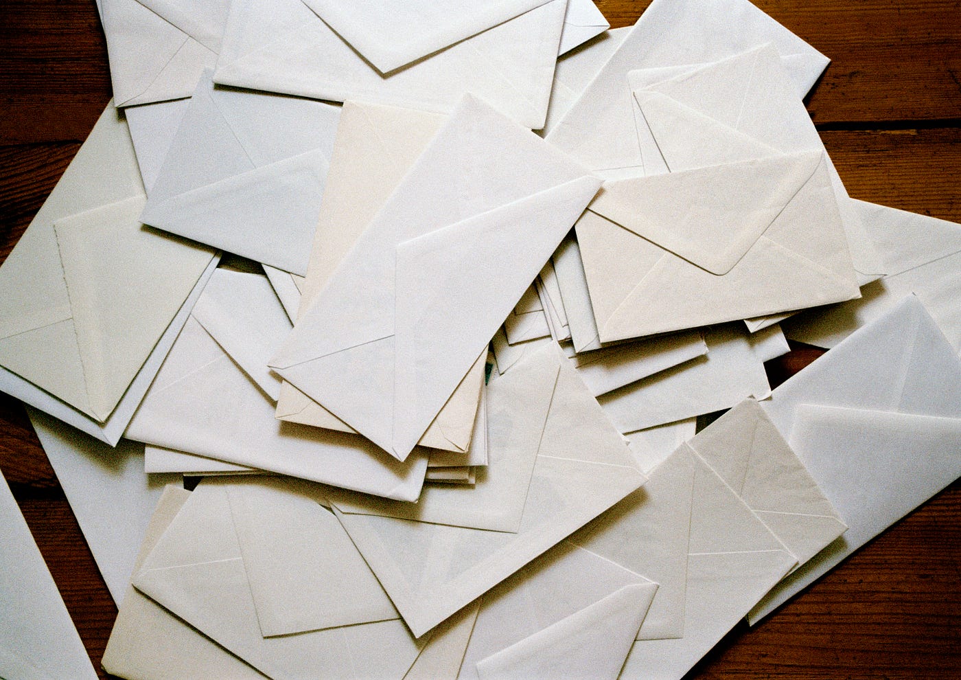 Dozens of blank envelopes scattered on the floor