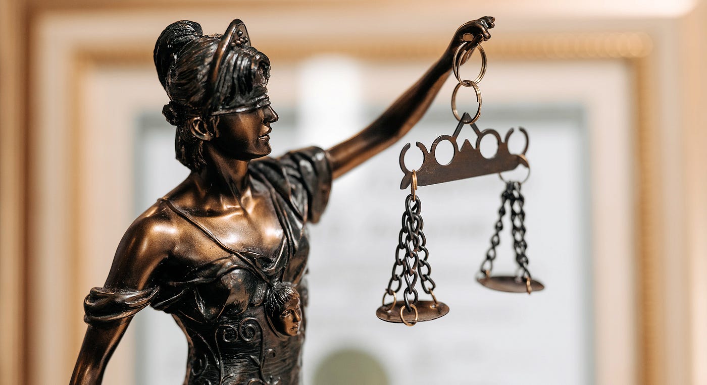 Statue of Justice holding the scales of justice