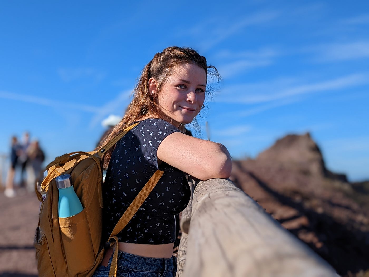 The Google Pixel 6 Pro in 915 Words 2 A portrait shot of a woman leaning on a fence at the top of Mount Vesuvius