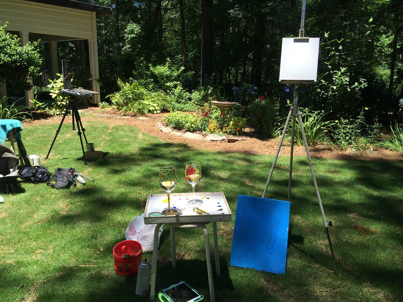 Easels and equipment, including wine, for painting plein air — photo courtesy of author, Marsha Hamby Savage.