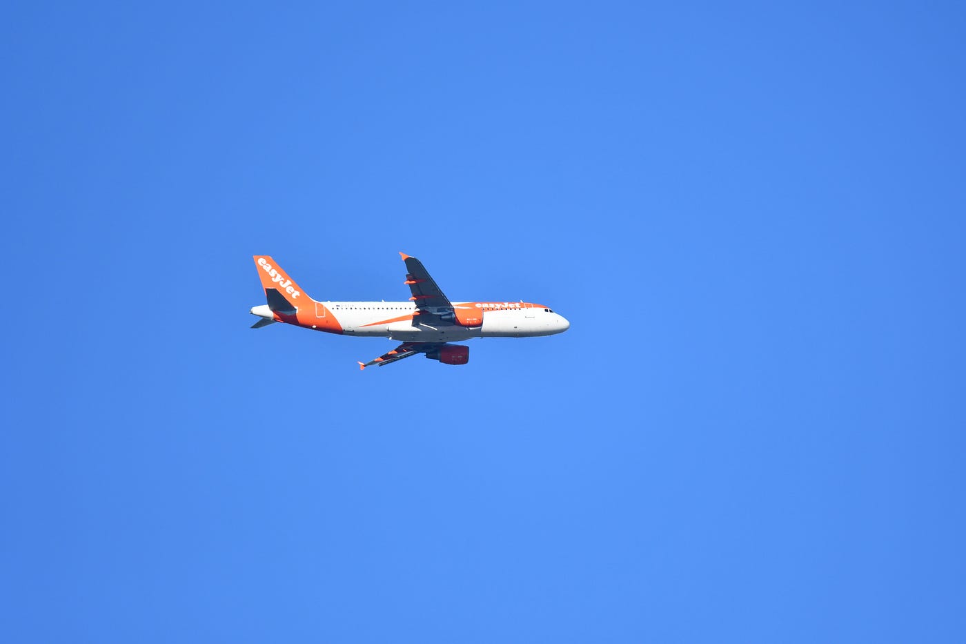 A plane against a blue sky. Susie Kearley.