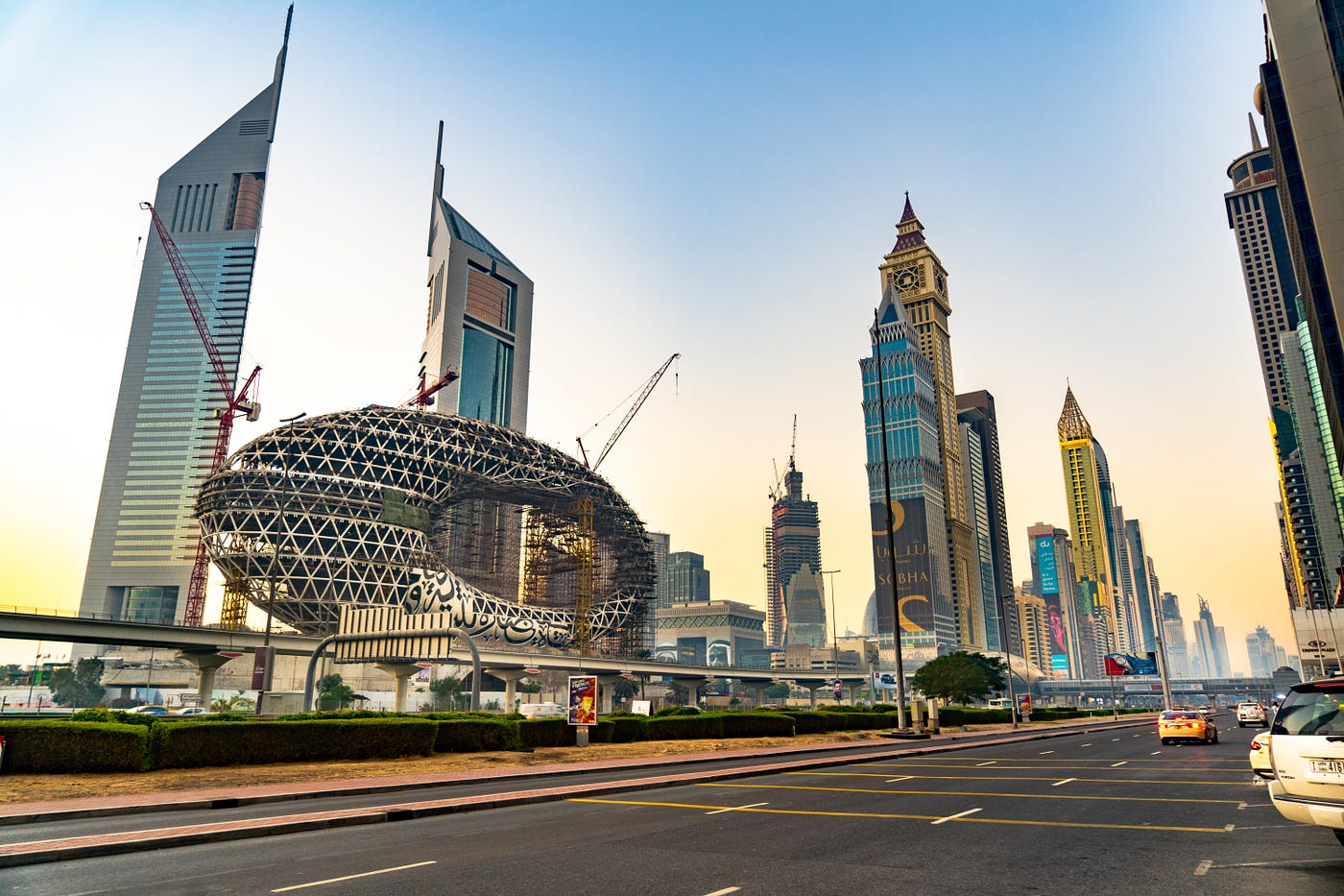View of Sheikh Zayed Road with Emirates Towers in the background.