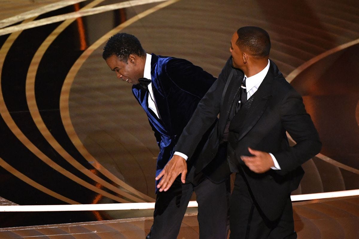 Will Smith slapping Chris Rock at the Academy Awards