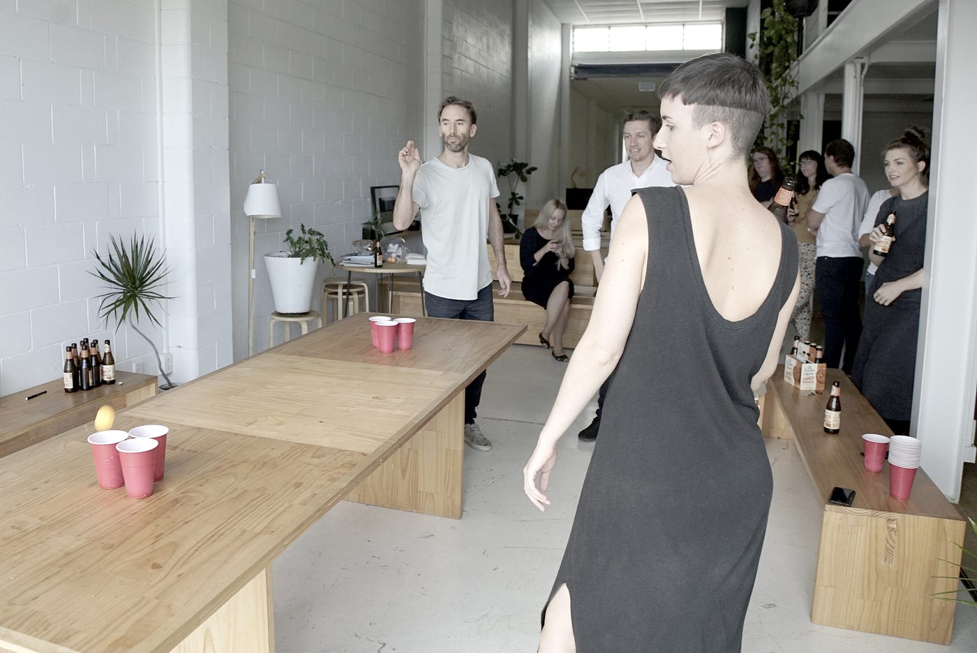 Matt playing beer pong with the team. You can see the slight blur of an orange ball about to land in the cup – he never misses, and it’s INFURIATING.