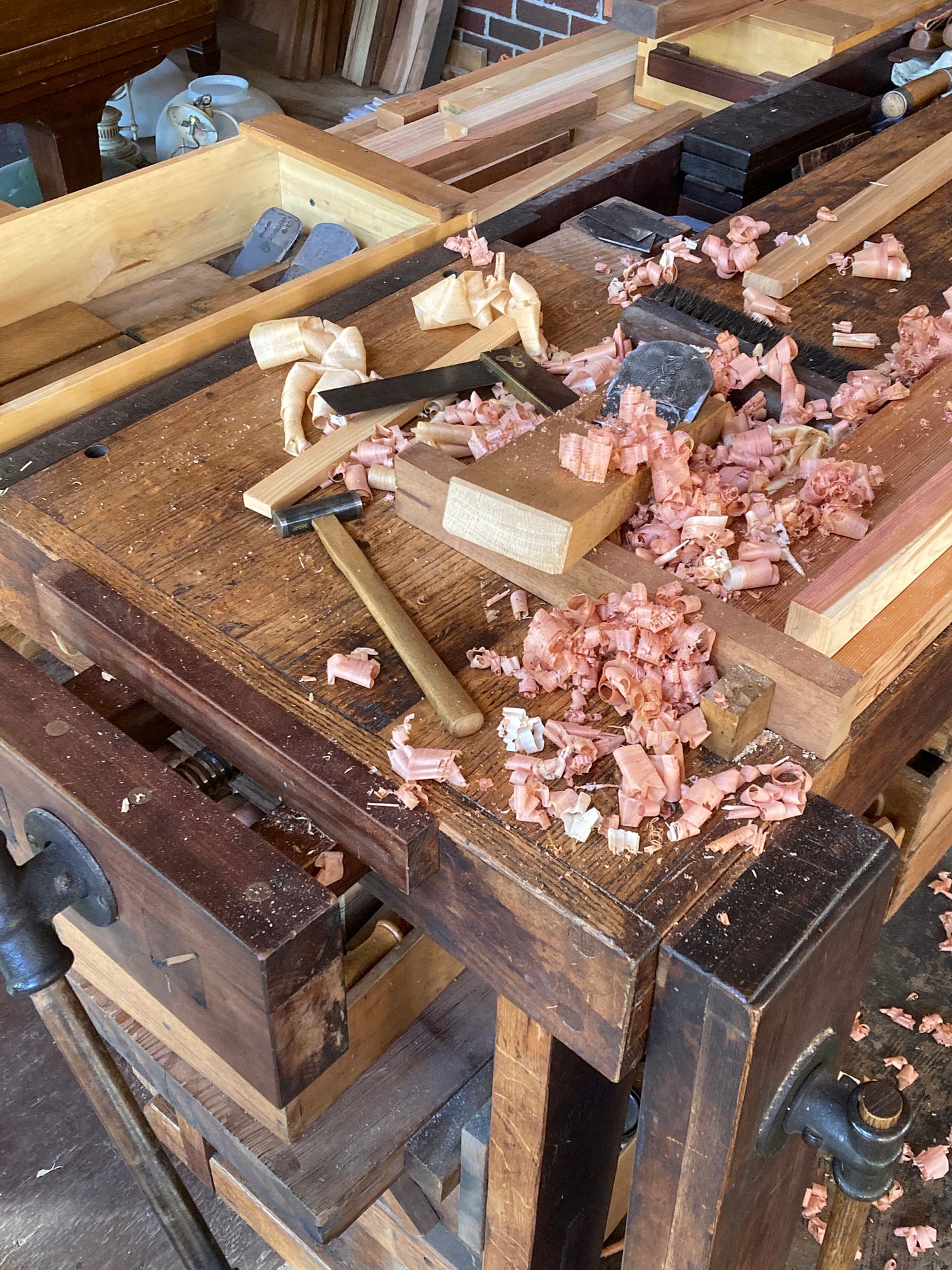 To a woodworker, the workbench is an altar. Here, we give our blessing to wood, pay debts, offer libations, make sacrifices, focus intent and energy. The pieces we make mostly move on out of our hands, into other people’s lives. The bench, with all its vices and imperfections, remains.