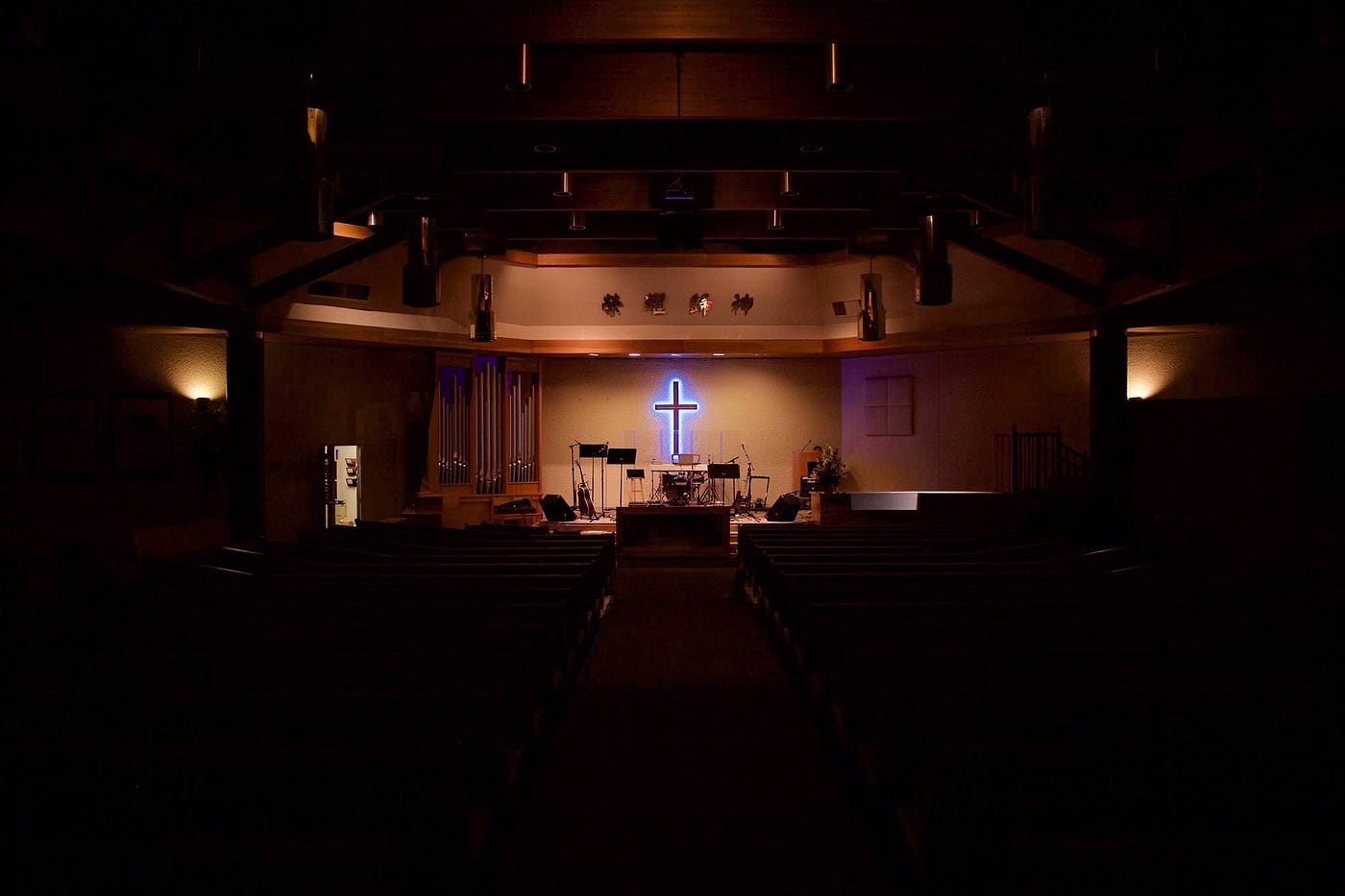 blue cross in an empty sanctuary