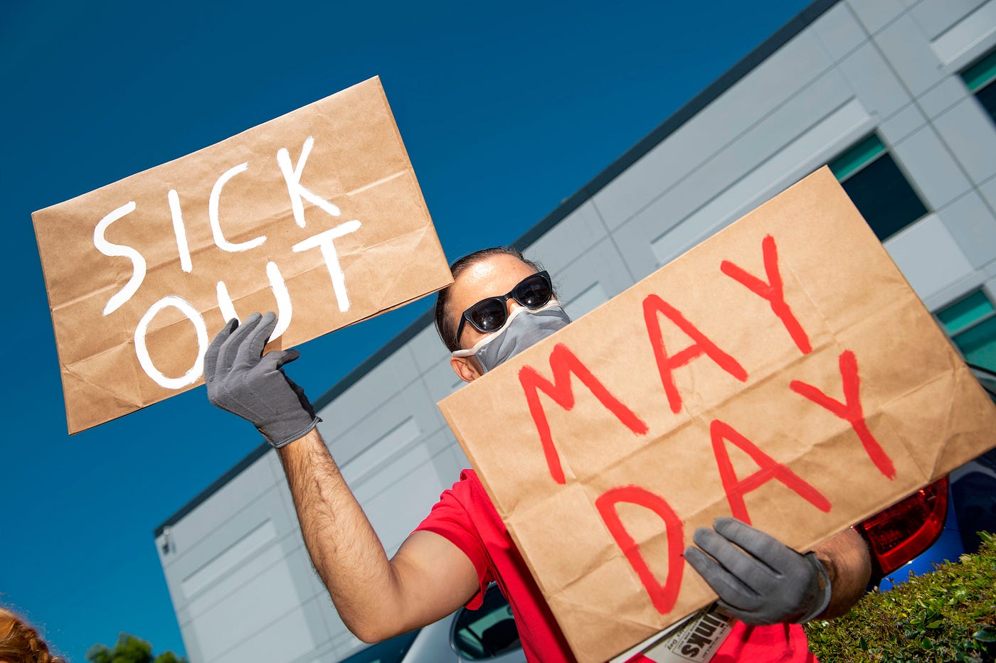 Workers protest against the failure from employers to provide adequate protections in the Amazon delivery hub workplace.