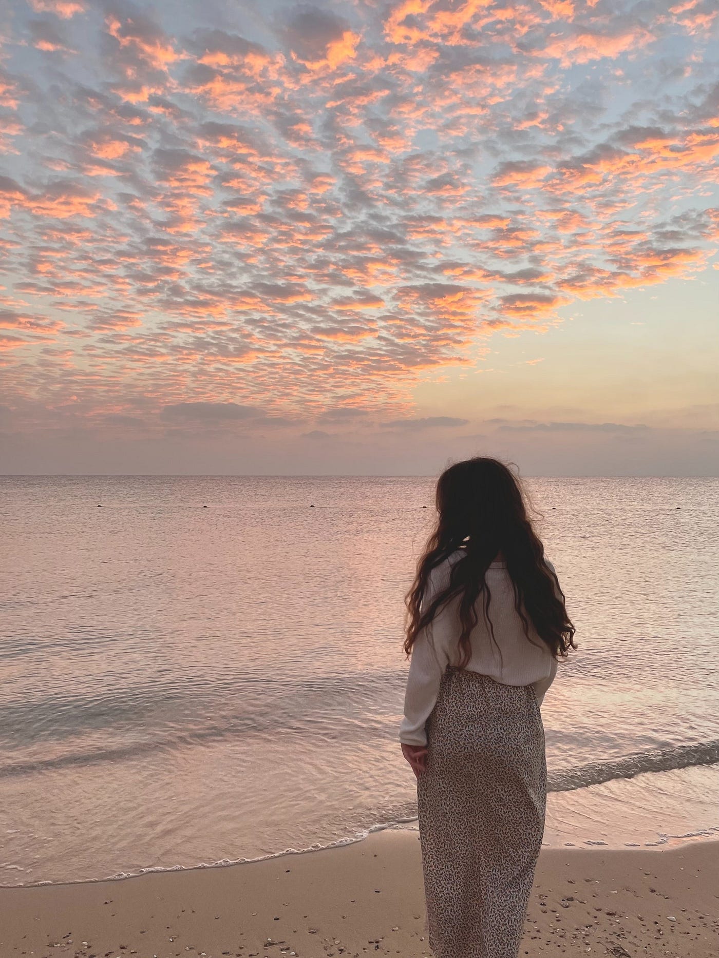 Woman gazing at the ocean
