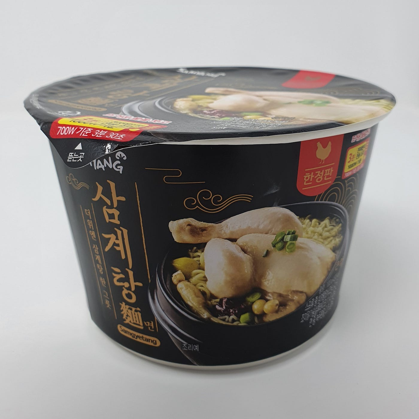 An unopened cup of Samyang Samgyetang Myeon Instant Noodles.
