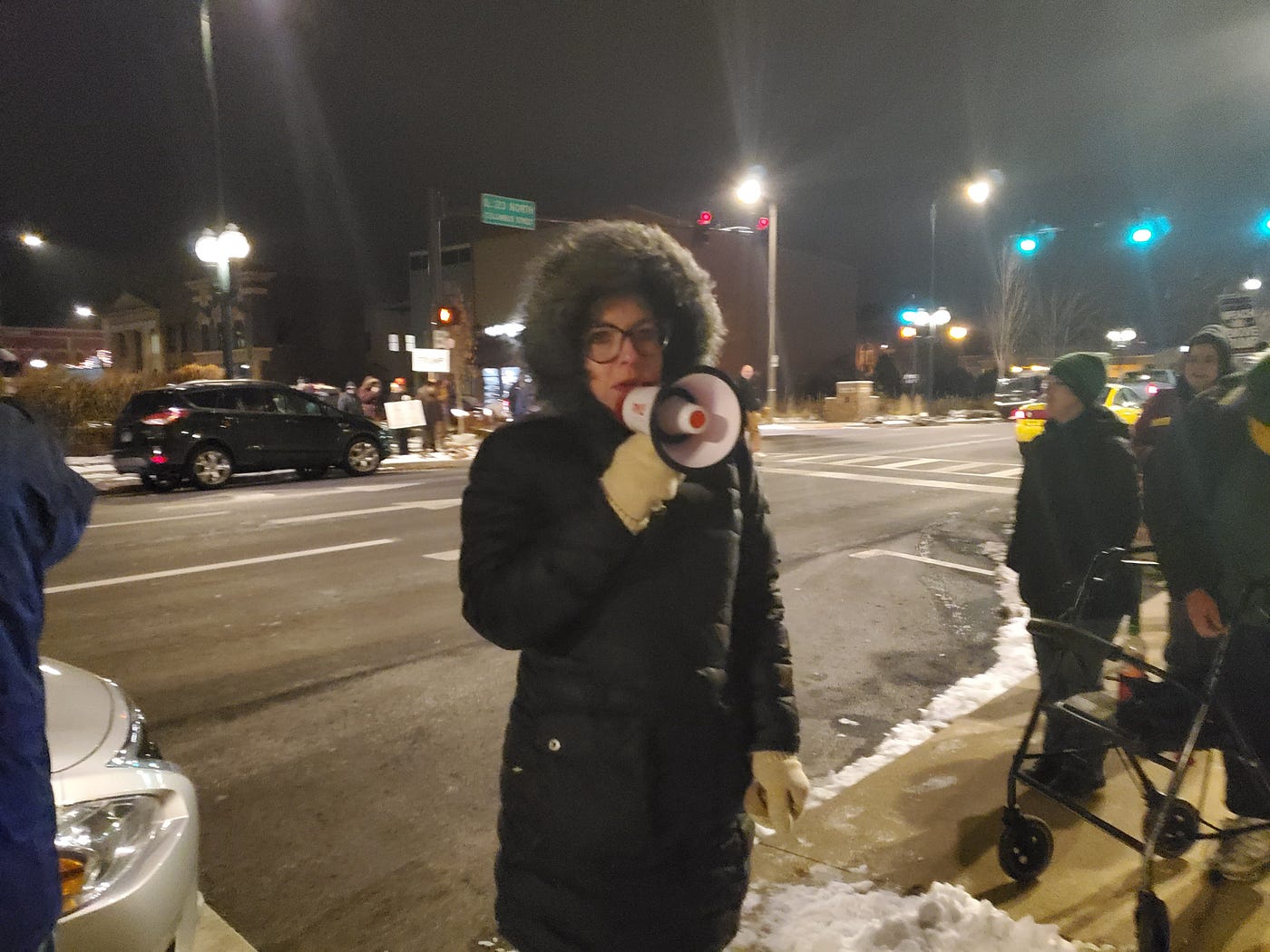 Dani Brzozowski speaking to residents out in the streets.