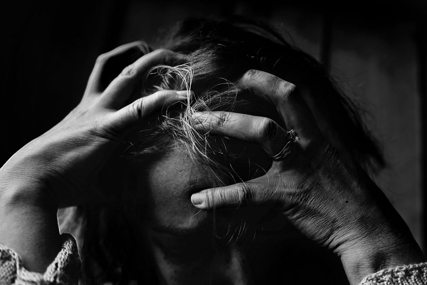 woman holding her head, handle things well