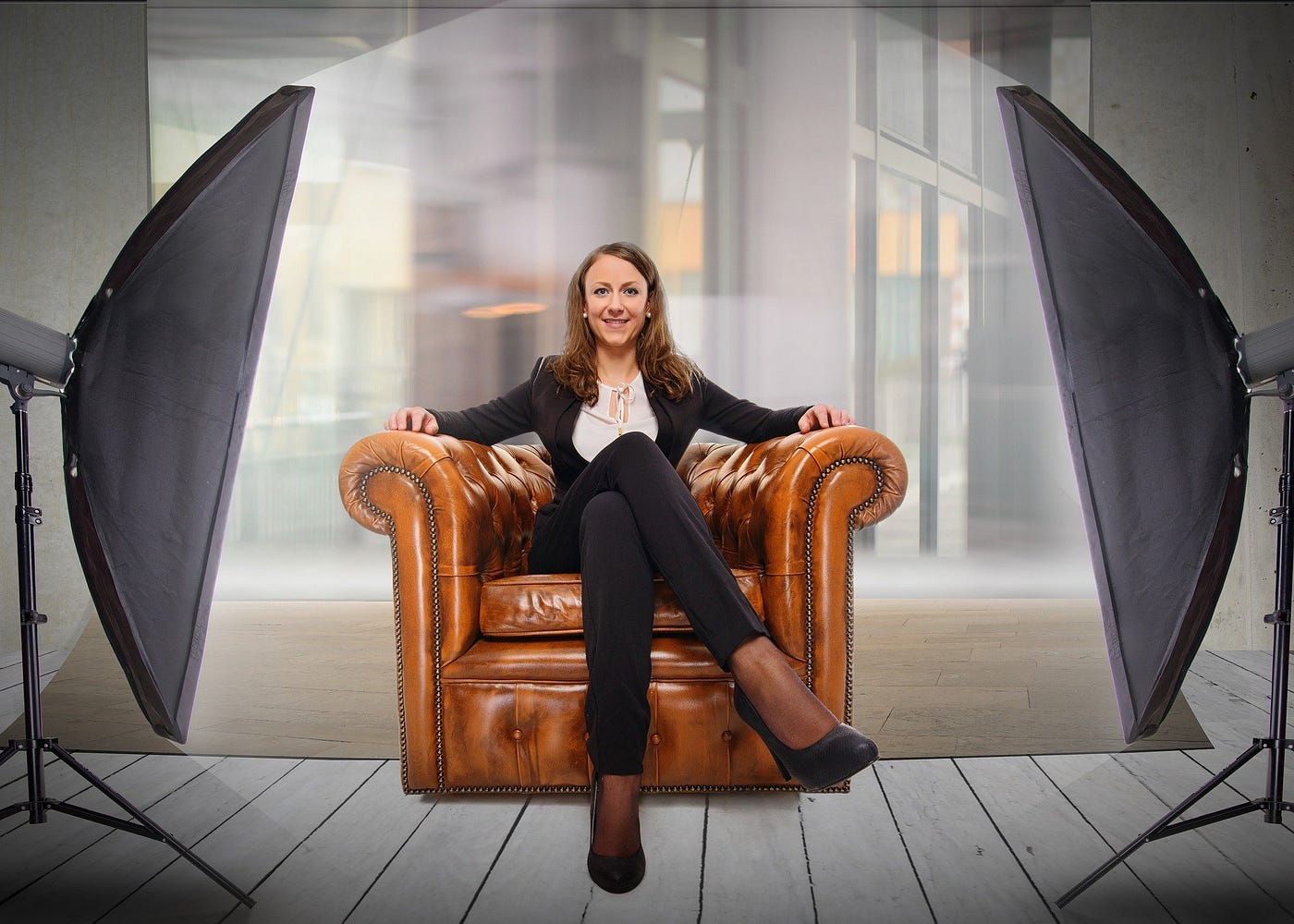 Business woman in chair for interview