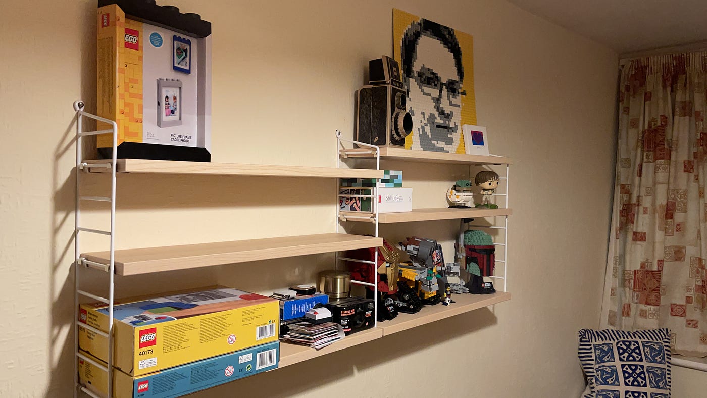 Shelving on the well opposite from my desk — the “LEGO shelves”