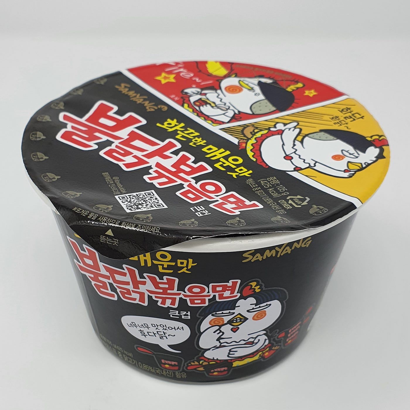 A slightly opened cup of Samyang Buldalk Bokkeum Myeon Instant Noodles.