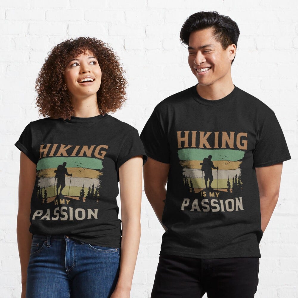 Man and Woman Wearing a black classic t-shirt with amazing illustration and text saying “hiking is my passion”.
