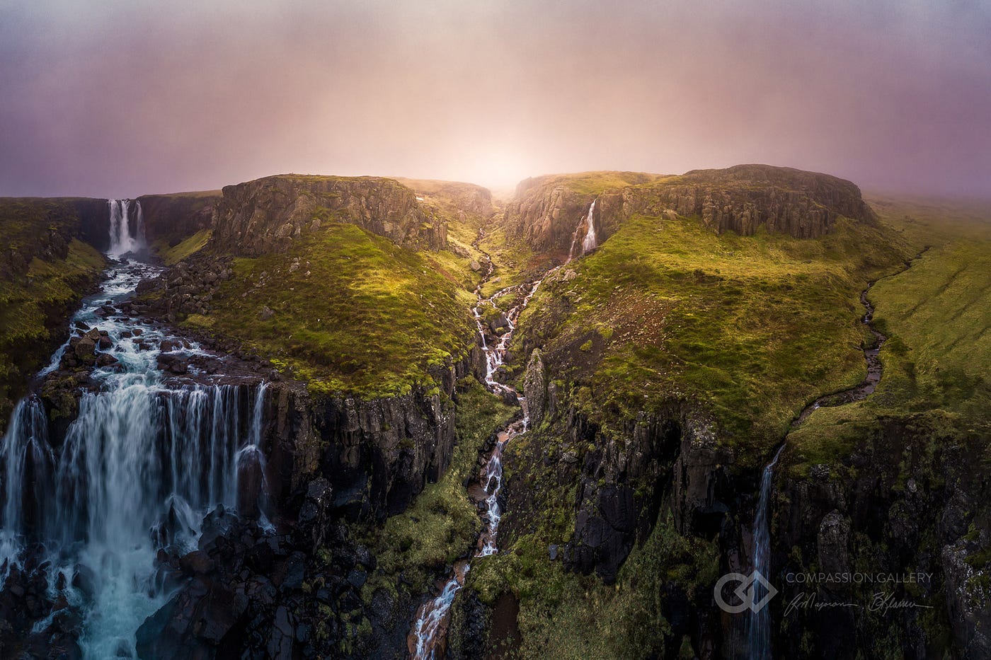 Waterfalls over a mountainside in Iceland