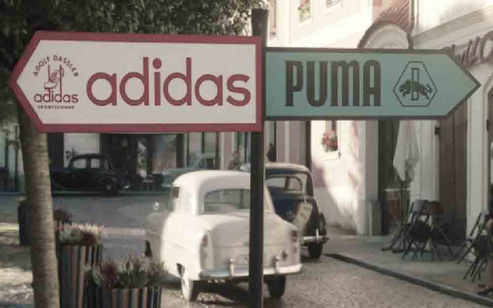adidas puma storia