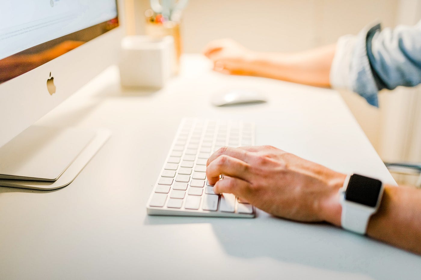 Man using a mac for his online business