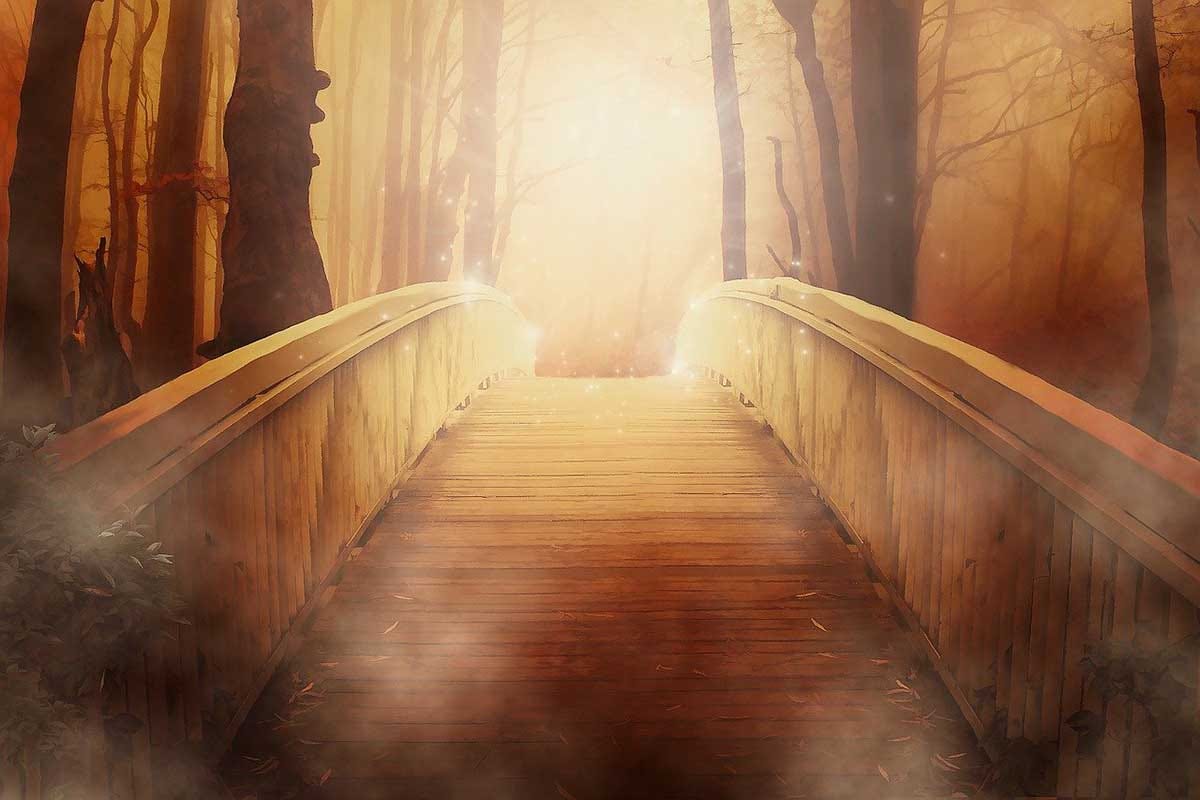 bridge sloping upward into gold distance