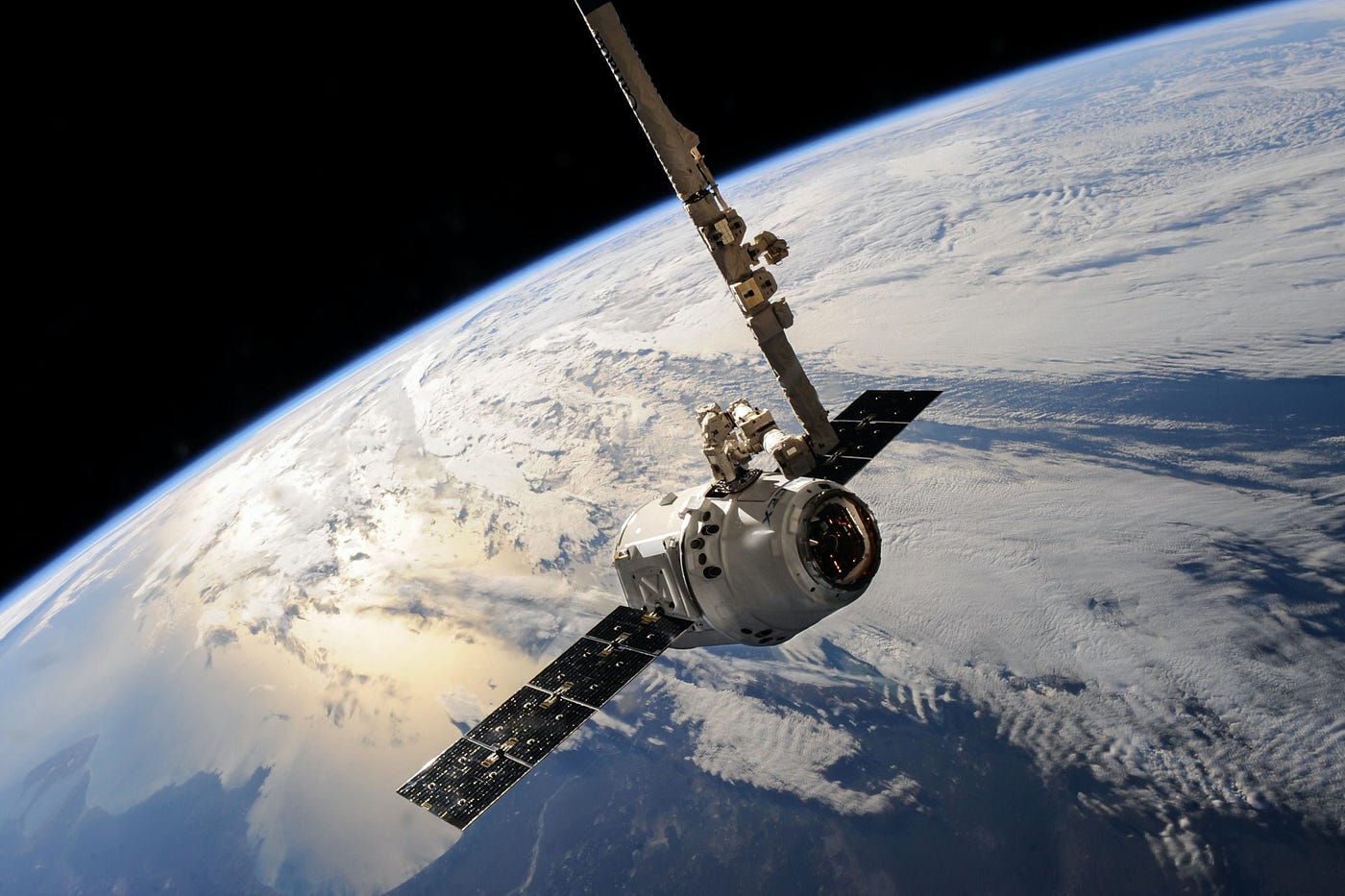 View of the earth from behind an orbiting satellite