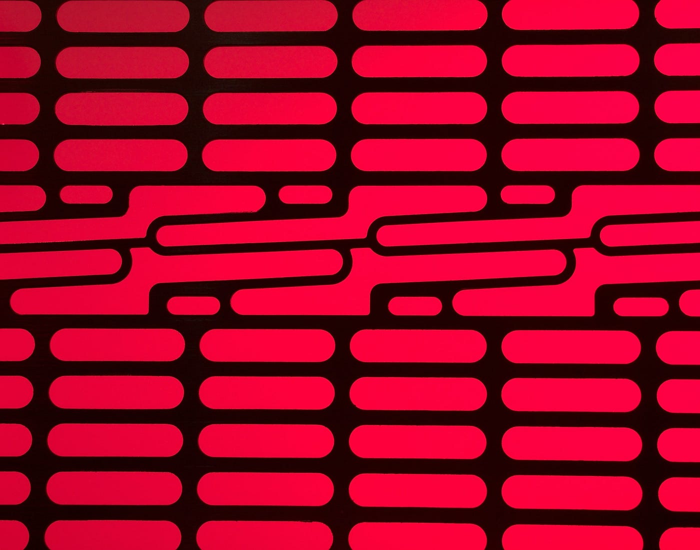 Reddish-pink grid with black lines