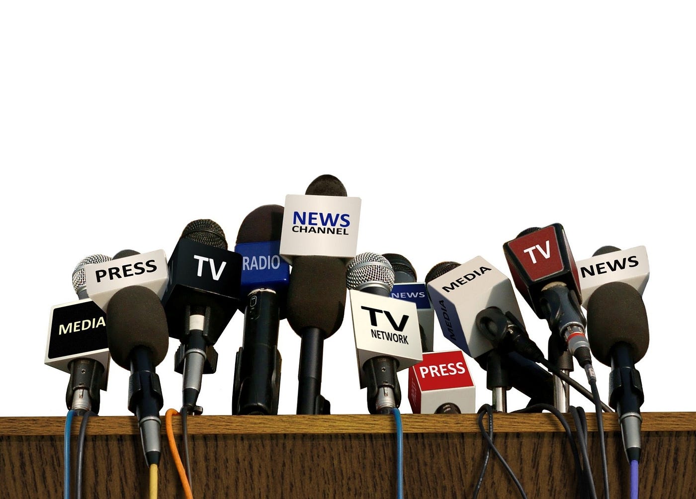 Podium with microphones representing different forms of news media