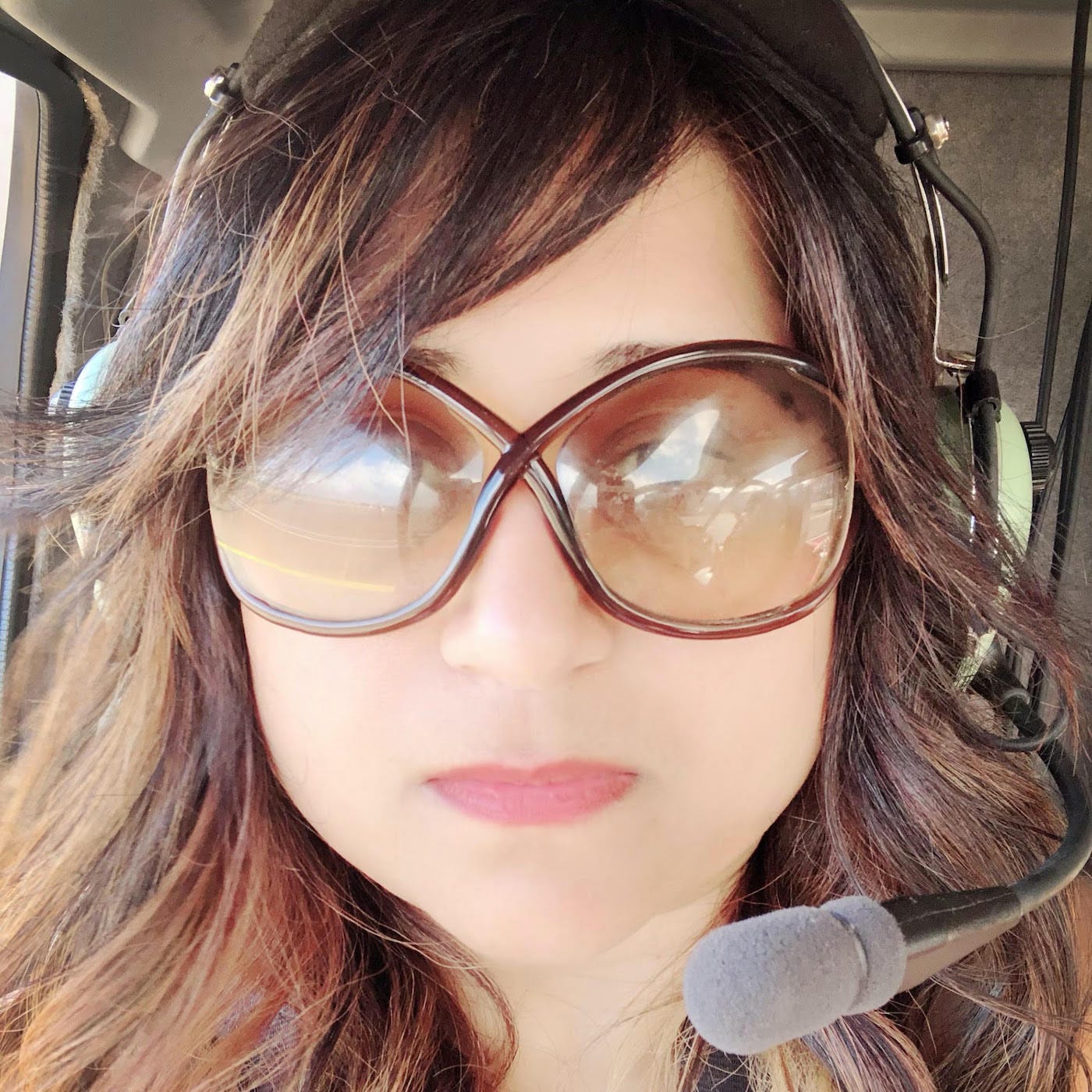 Menka during one of her helicopter piloting lessons.