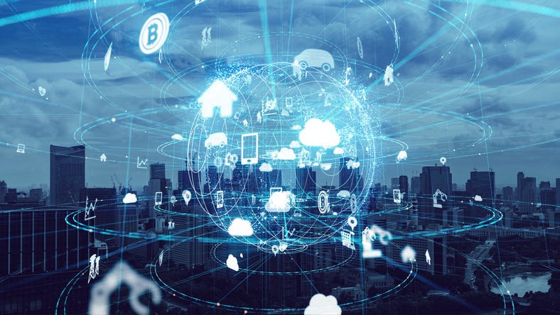 Blue city from a distance with the virtual globe superimposed on top indicating the connectivity for all things