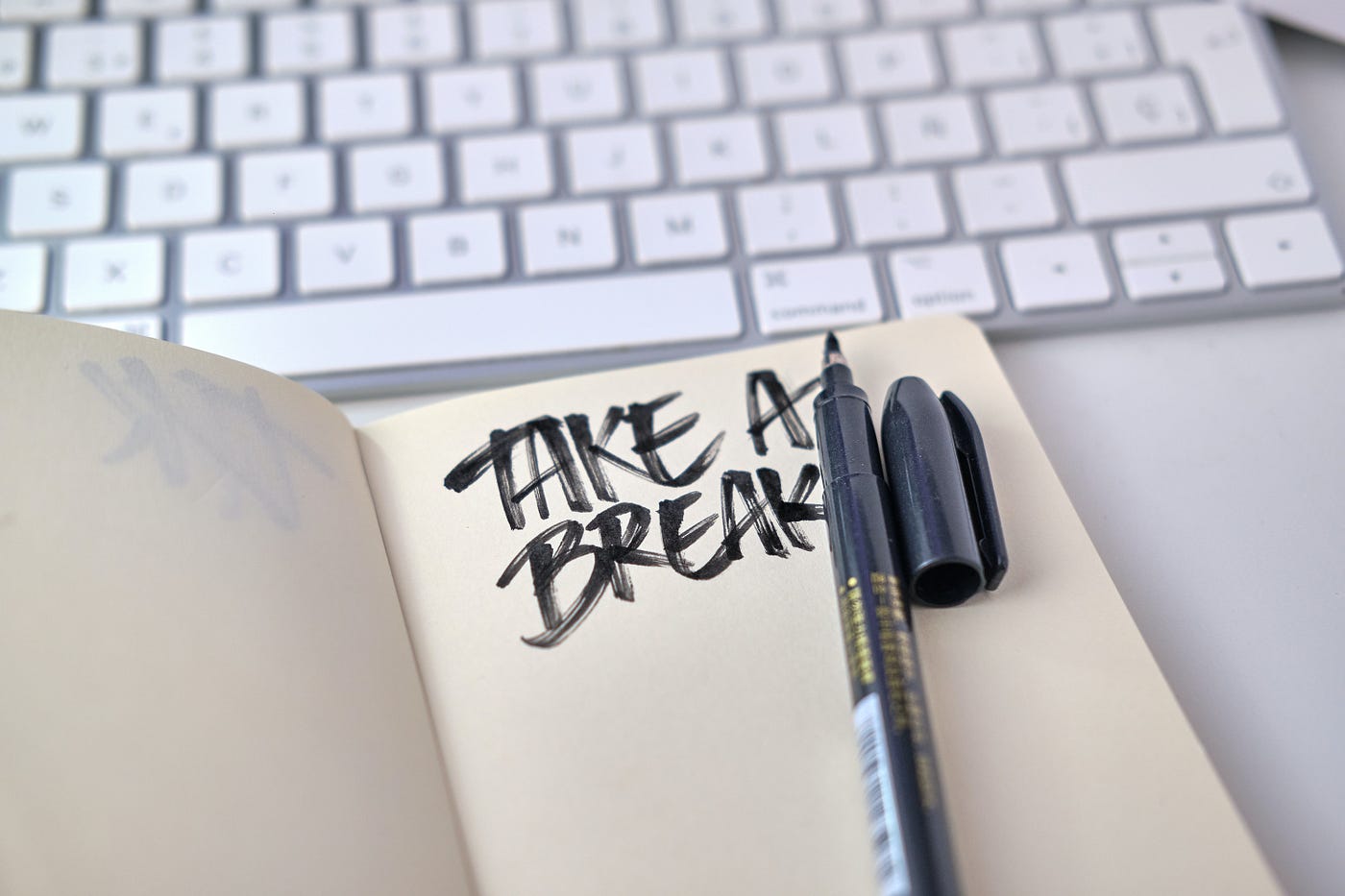 Notebook with “take a break” scrawled inside.