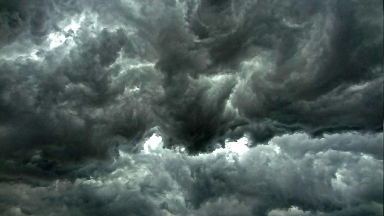 Thunderstorm clouds representing the tussore-silk curtains that shadowed our souls in Japan today
