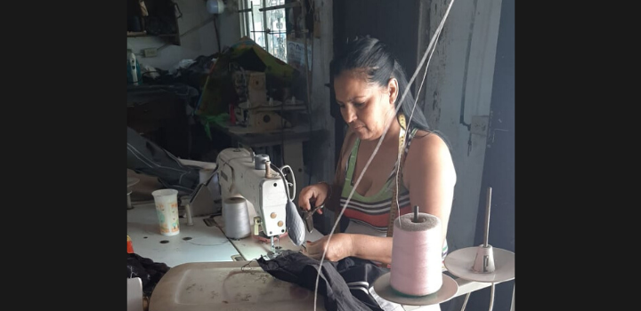 A woman uses cash transfers for a safer livelihood.