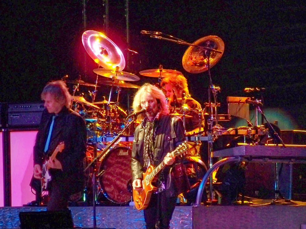 The rock band Styx playing live at a concert.
