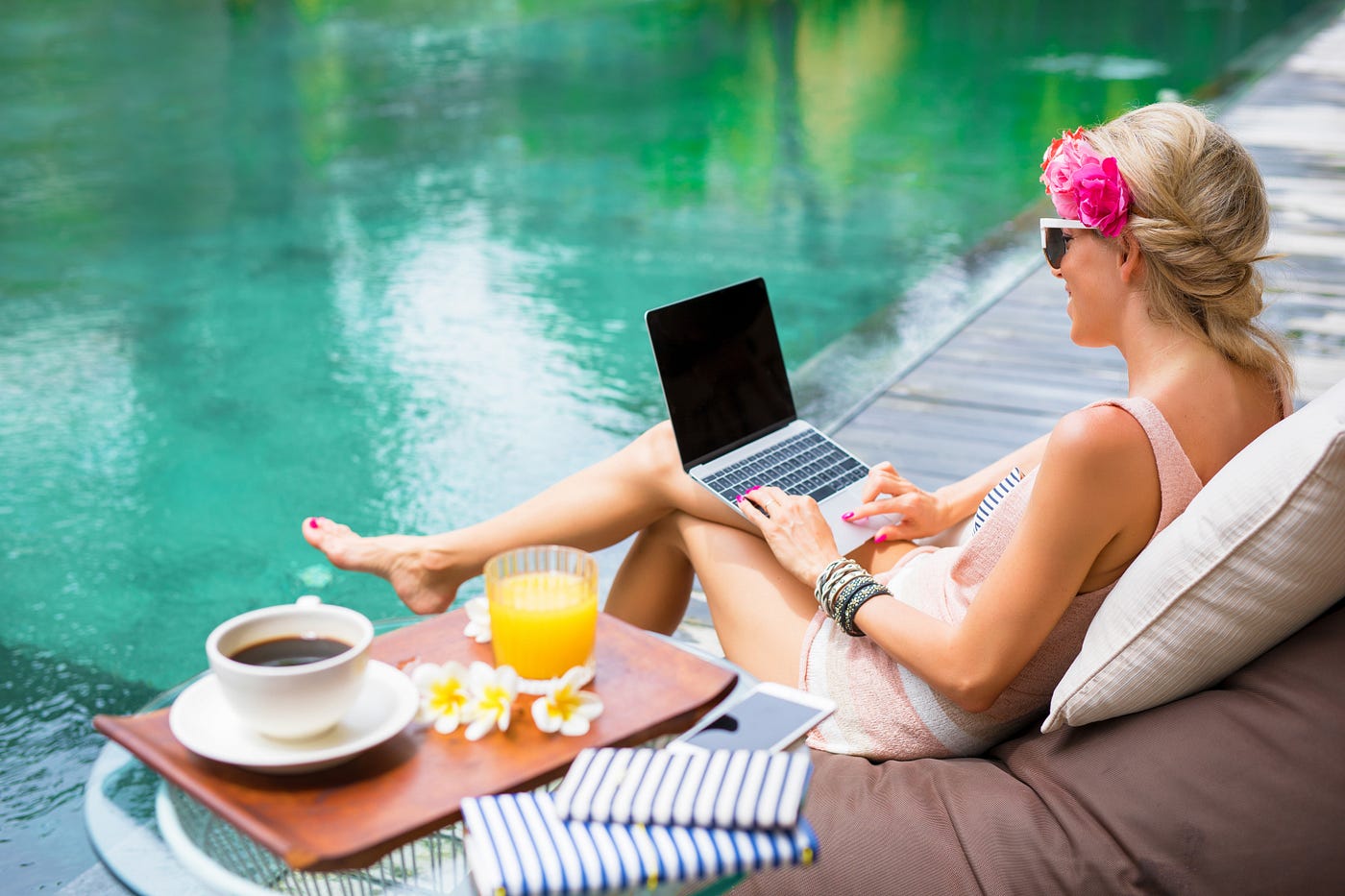 Women working by the pool