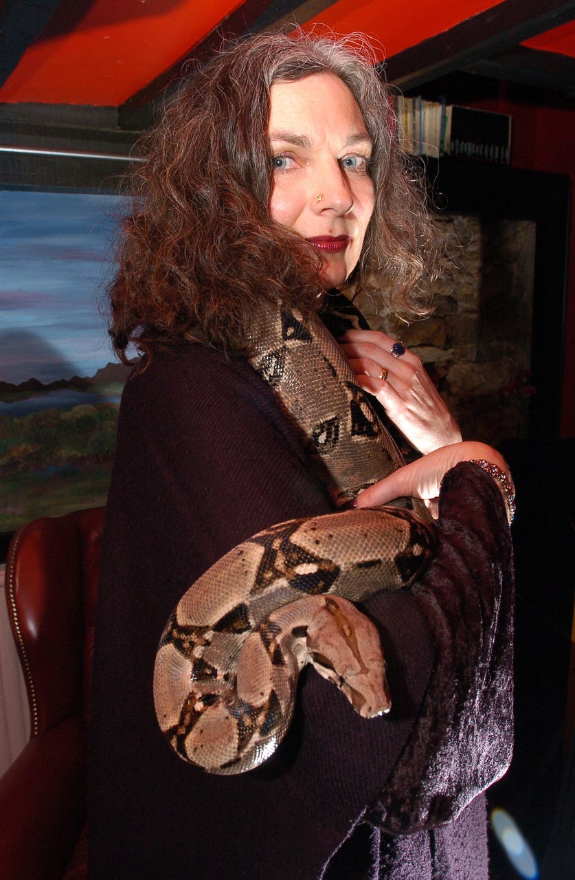 author holding her boa constrictor