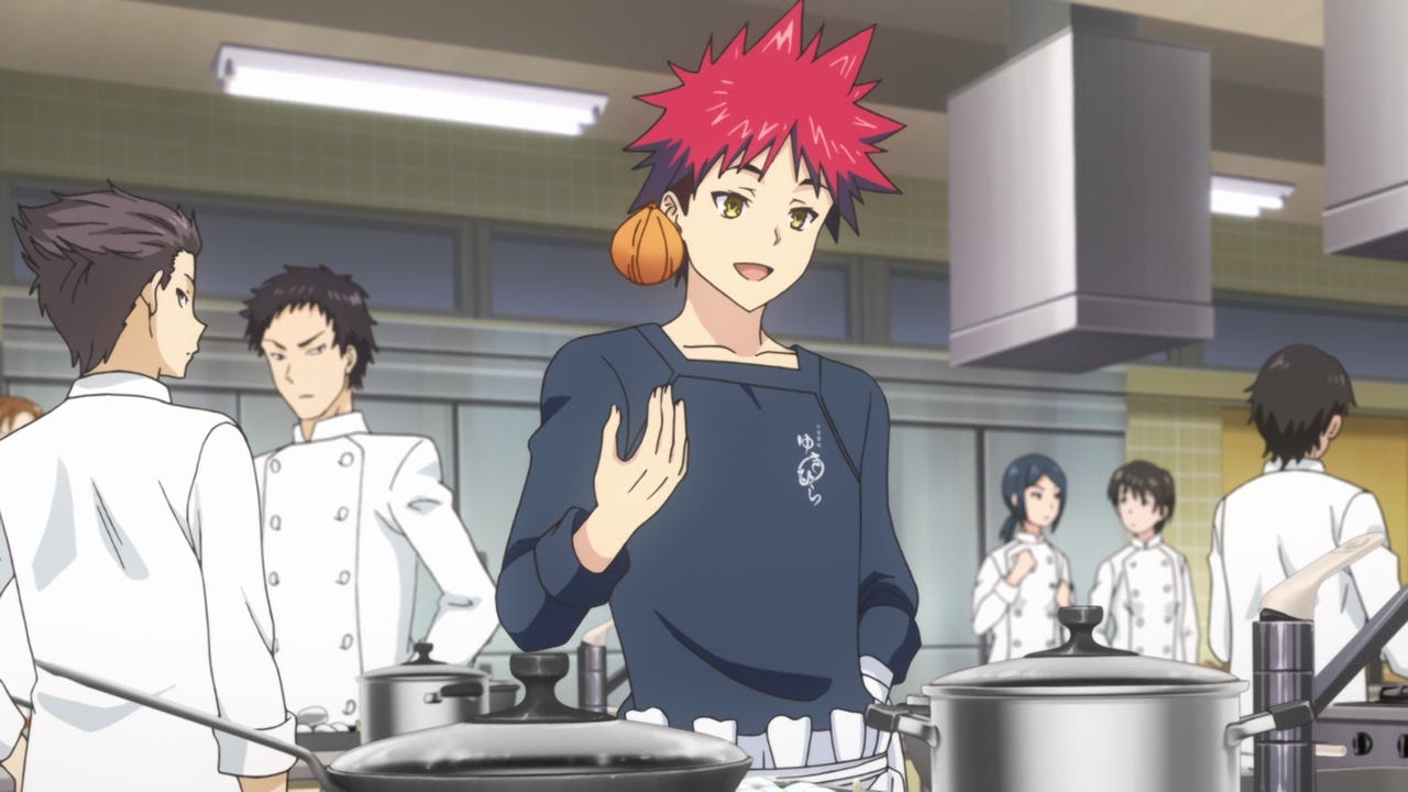 A screenshot from episode 3 of Food Wars showing Soma cooking in class.