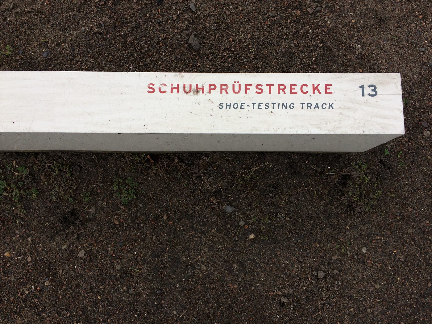 Label for the shoe-testing track, at Sachsenhausen