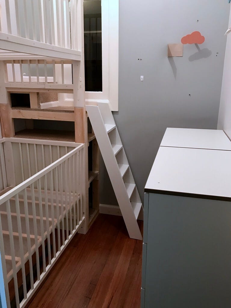 bunk bed with crib on bottom