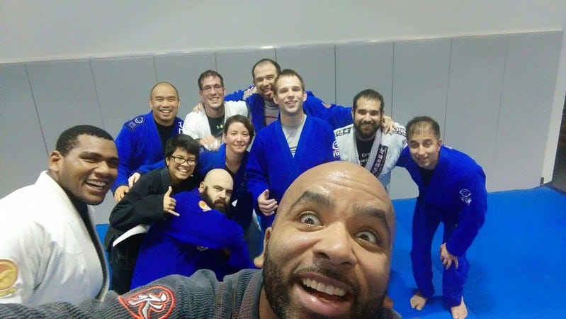 A group of BJJ teammates posing for a selfie photo