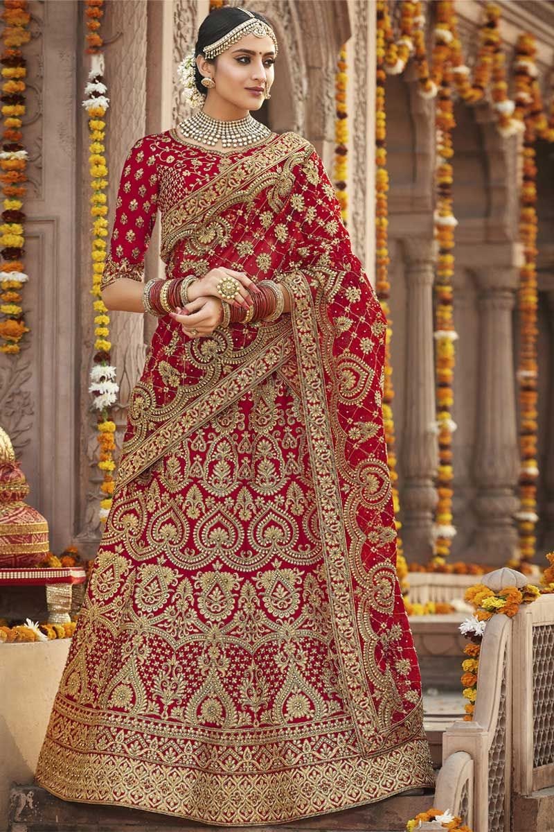 red heavy bridal lehenga