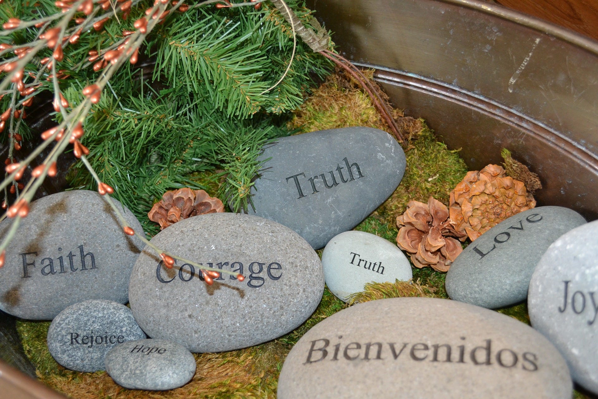 Stones with words written on them.