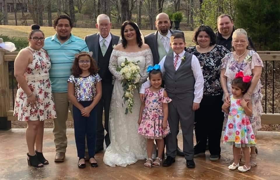 One of my wedding photos with the family that adoption built.