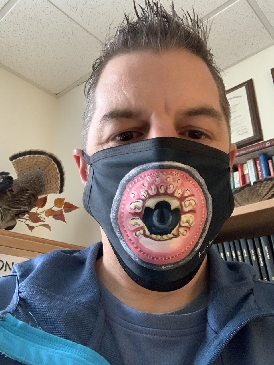 trent sutton in a lamprey mask