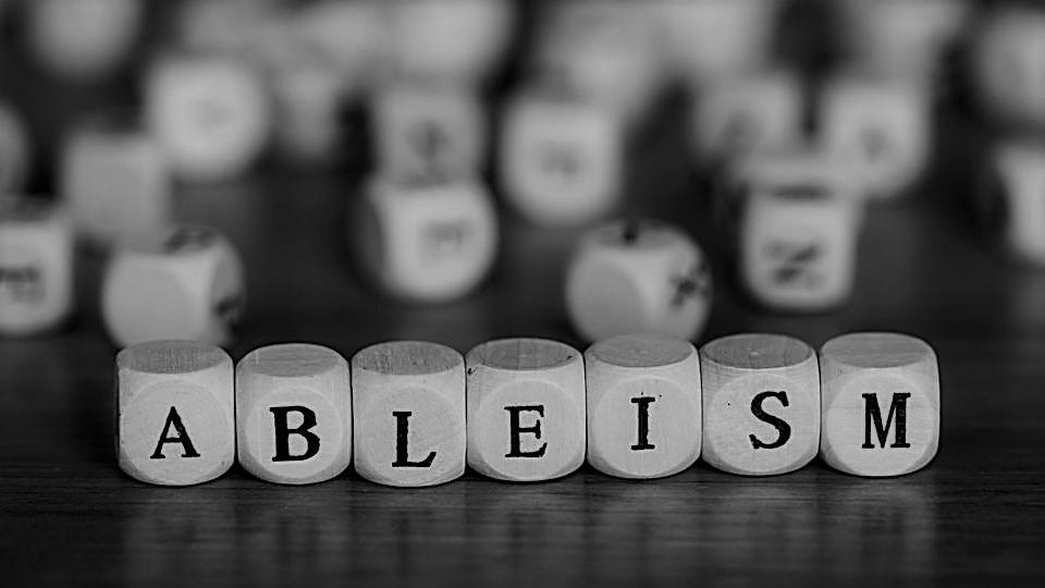 Dice spelling out the word ABLEISM