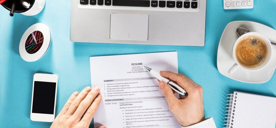 Jobseeker reviewing resume for assistance