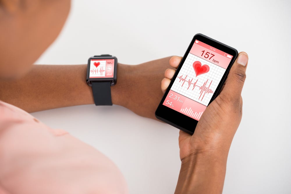 which is better iwatch or fitbit