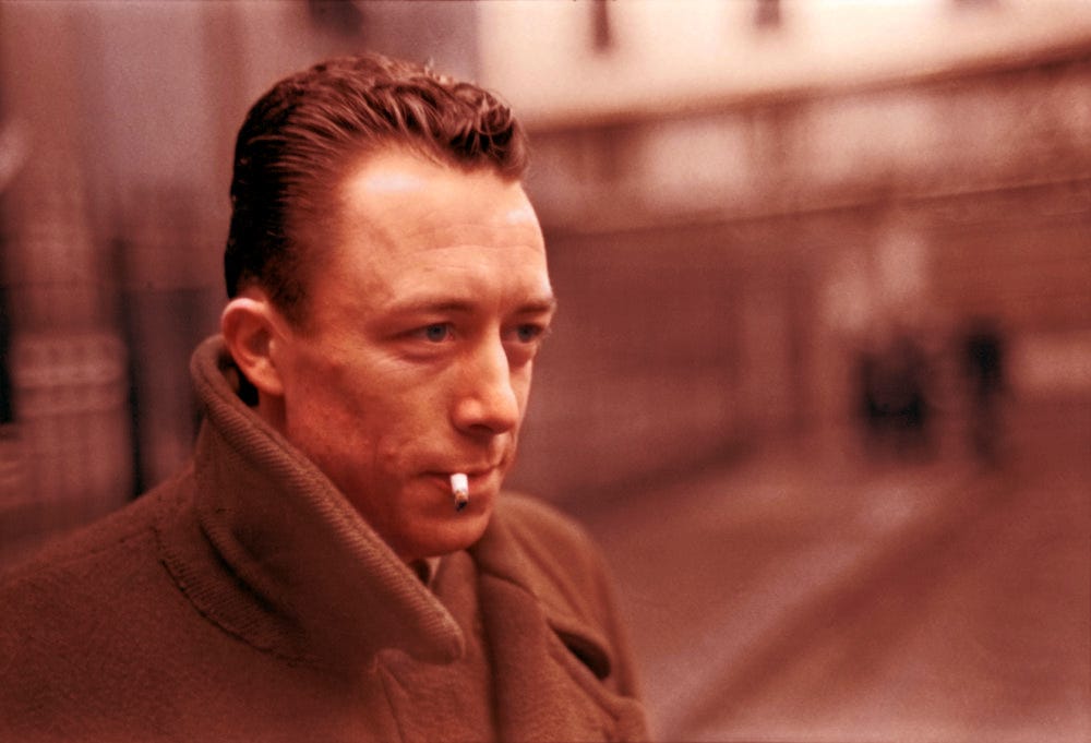 Albert Camus smoking cigarette