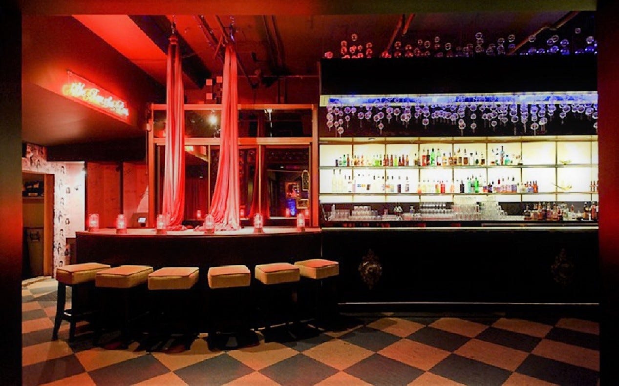 A club bar with colourful lights and glass