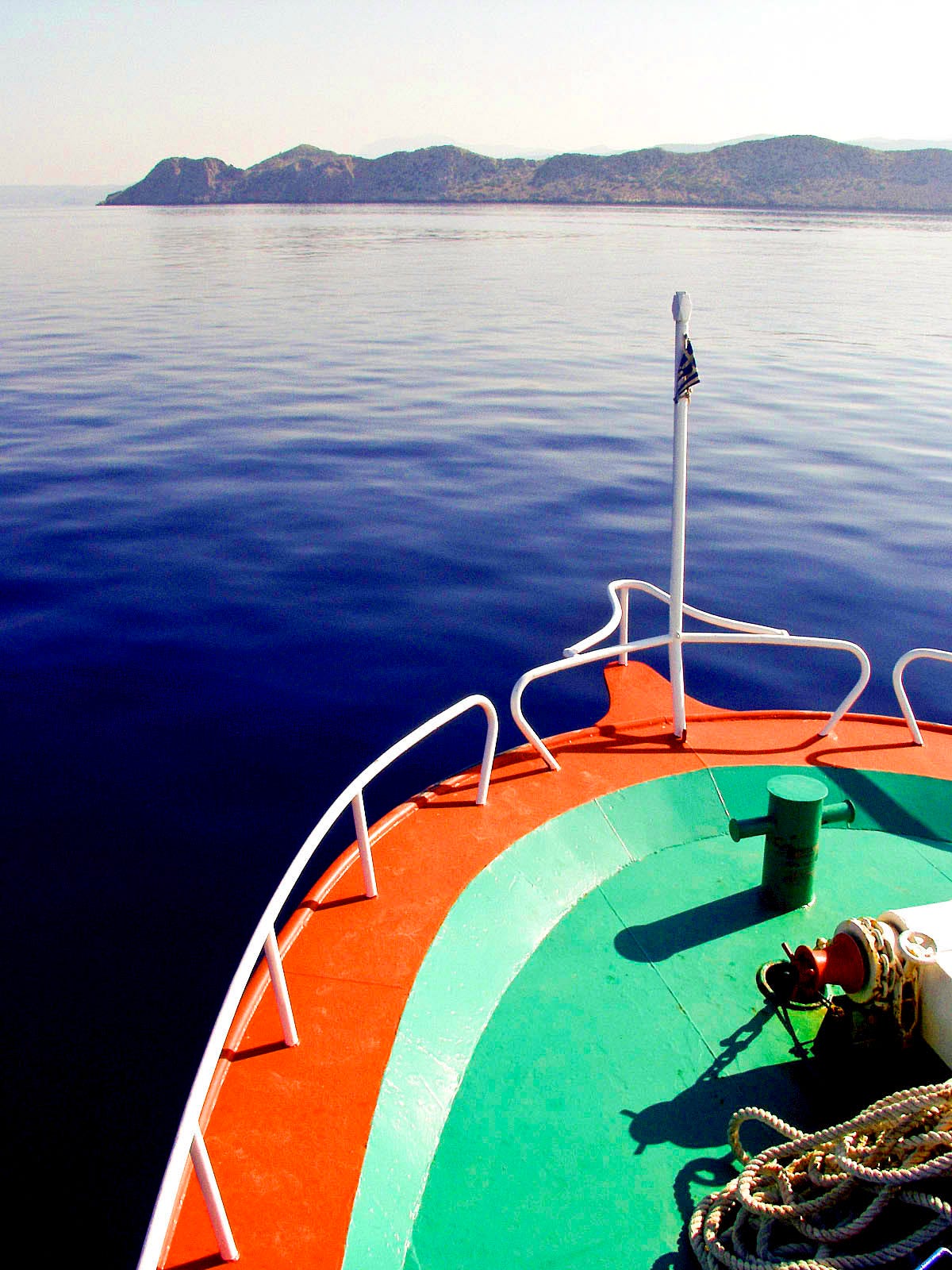Photo of the front of a ship sailing forward.