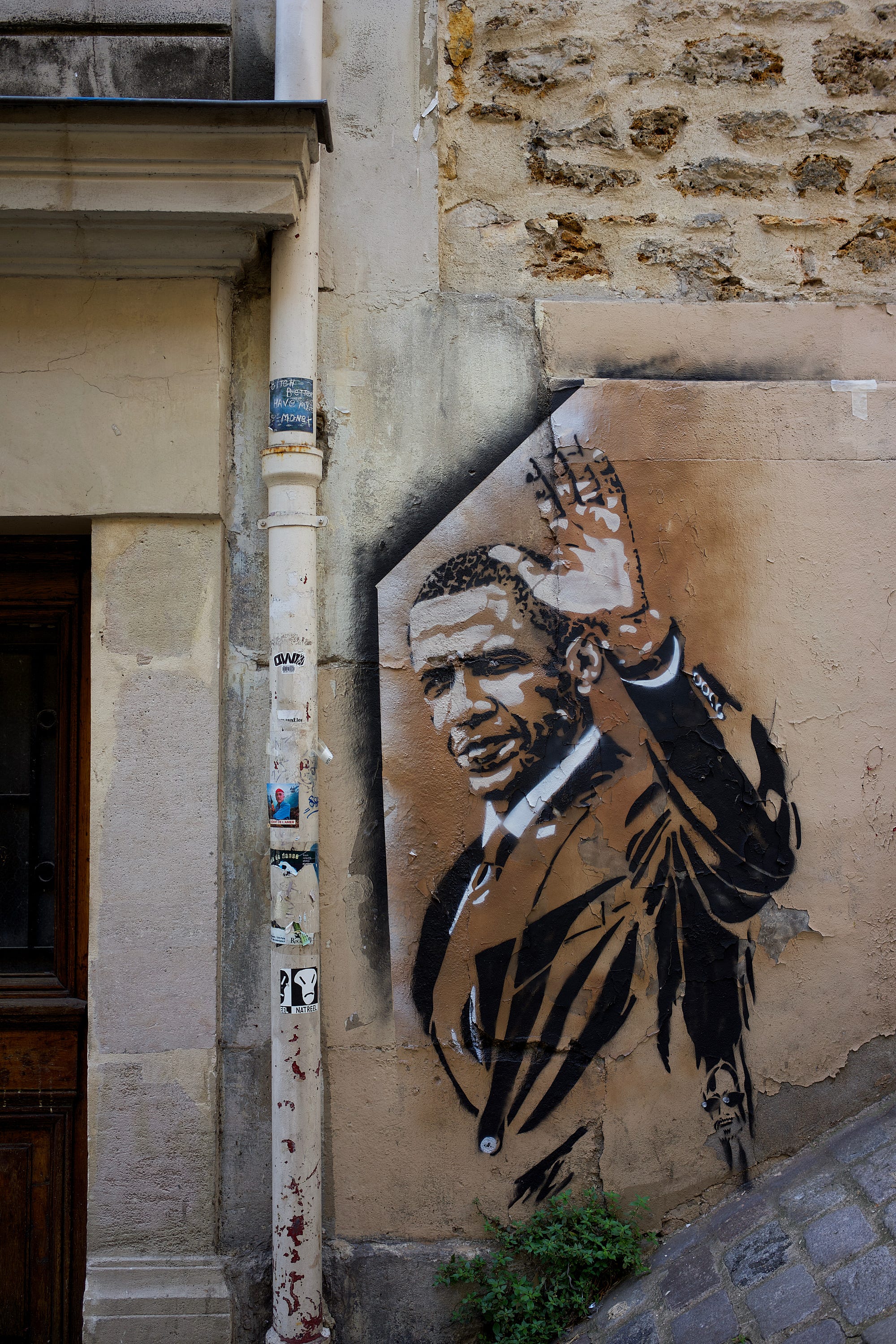 Painting of former President Barack Obama on an exterior wall.