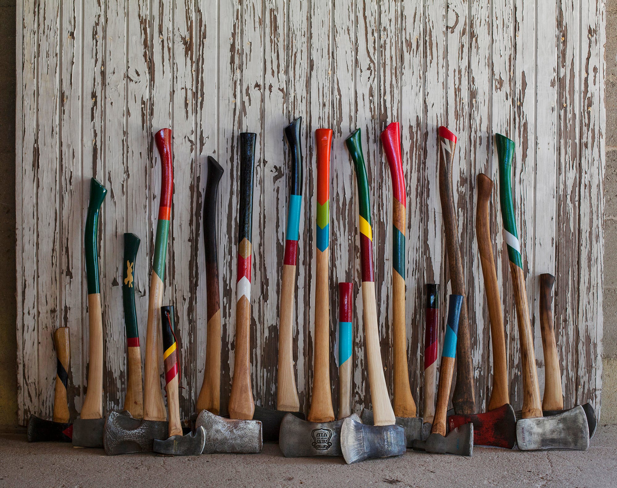 A collection of restored axes and hatches in a vareity of sizes and styles.